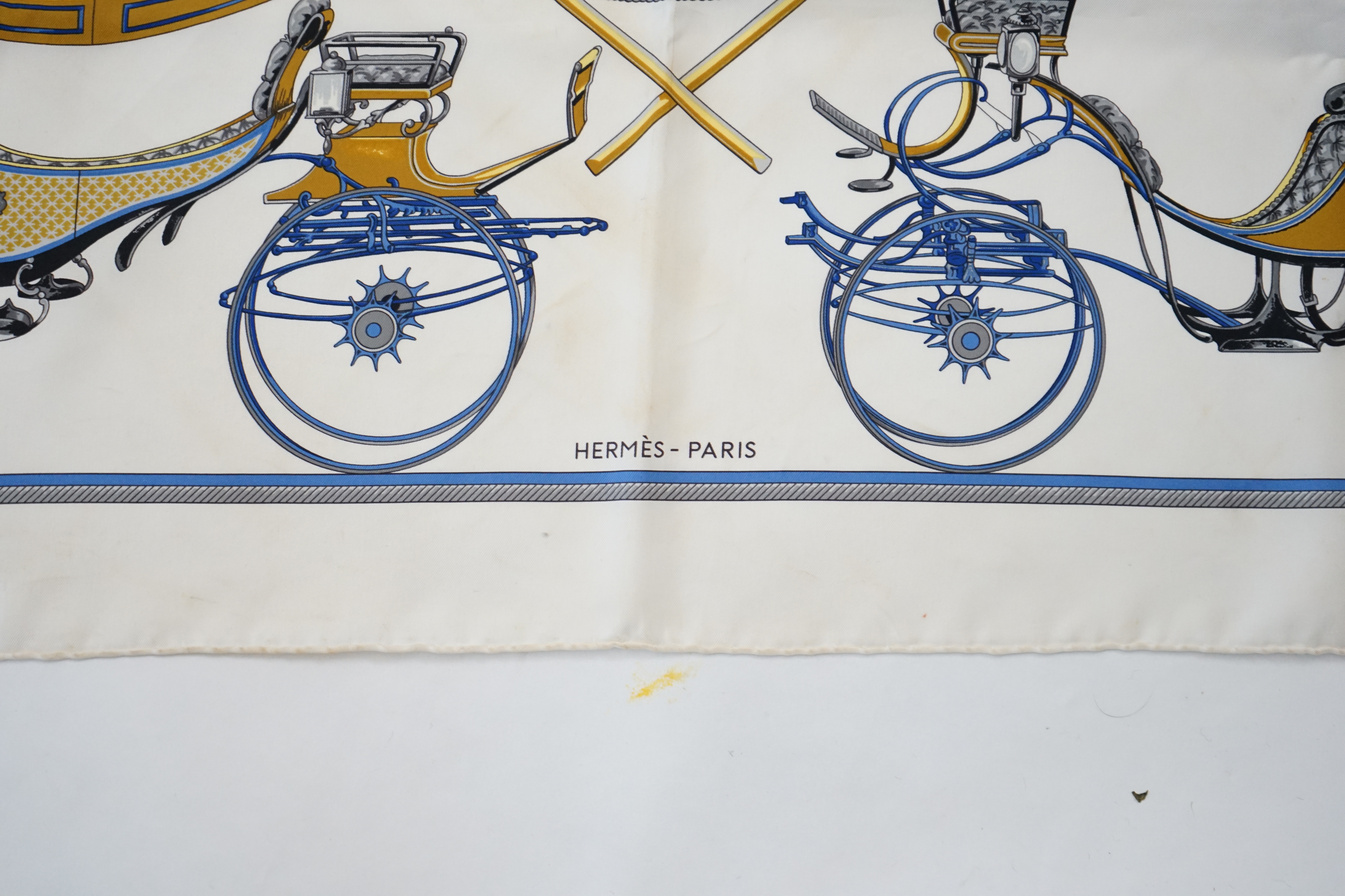 A Hermès Les Voitures a Transformation by Francoise de la Perriere black and white silk scarf, approx 90cm x 90cm